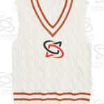 Classic white cricket sweater with cable knit design