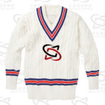 Classic white cricket sweater with cable knit design